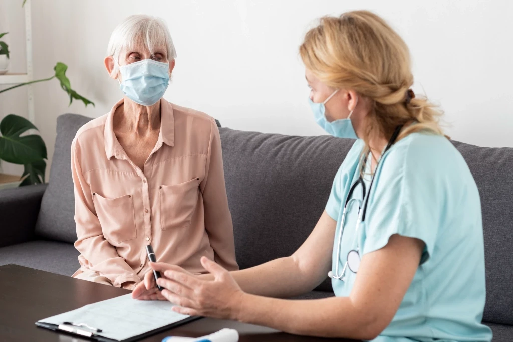 Home doctor sharing visit summary with a patient�s regular GP to support continuity of care in Australia